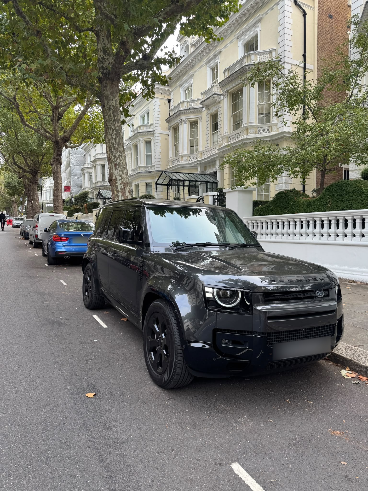 Black Land Rover Defender on a London street