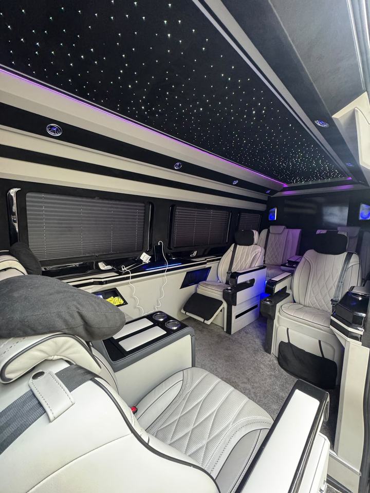Cream leather captain's seats in the Sprinter