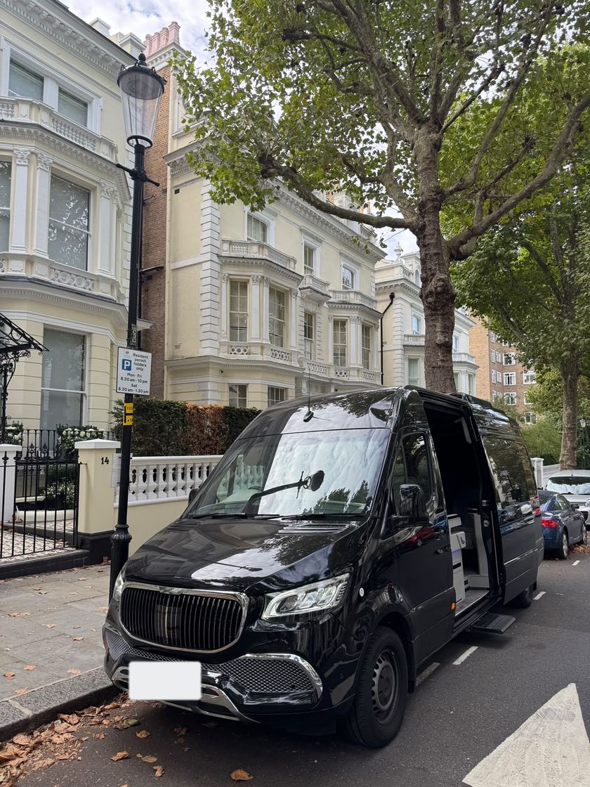 Black Mercedes Sprinter on a Kensington street
